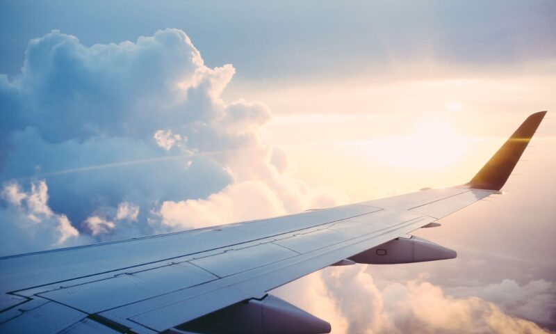 Airplane wing in the clouds